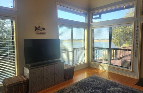 Burnet House | Lakeside Leisure - Peaceful waterfront home with a boat dock and game room.