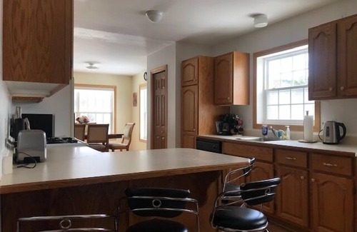 Presque Isle House | Lakeside Luxury, 4 bedrooms, 2 bath, sleeps 10. Outdoor Grill, Kayaks, Firepit.