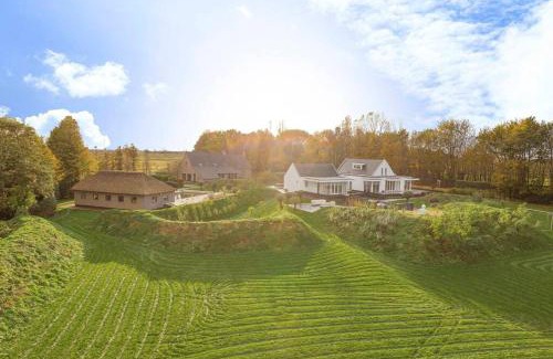 Ouddorp Villa | Landgoed Hermitage - Villa Minerva - XXL Zwemspa - max 16 personen