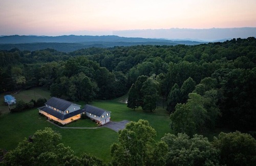 Lansing House | Lansing Orchard · Sleeps 29, 8300 sq ft house, 6 acres, stocked pond