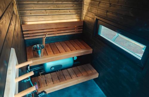 Kolari Ski Chalet | Lapland Riverside Cabin 1 VADELMA, Ylläs, Tiny Home with Sauna, Fireplace, Terrace, BBQ, Wifi, Ski, Fishing, Pets OK