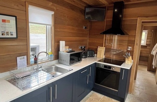 Cornhill on Tweed Ski Chalet | Larch Lodge - Idyllically situated Lakeside & private hot tub fishing riding