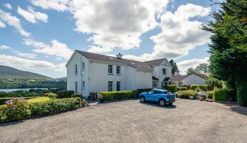 Kenmare House | Large 5 bedroom home to sleep 10 people with wonderful sea views