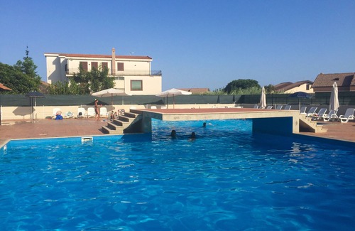 Capo Mulini Apartment | Large and elegant two-bedroom apartment in residence with pool