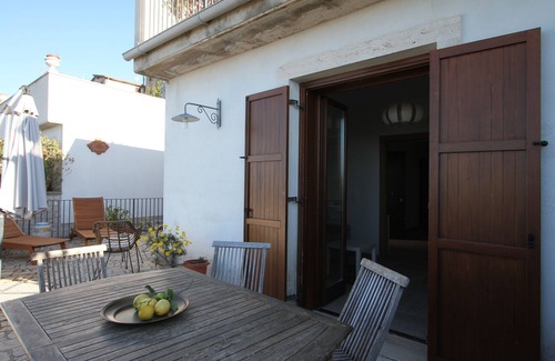 Sermoneta Apartment | Large apartment in a medieval stone Court, terrace, great view, pool use