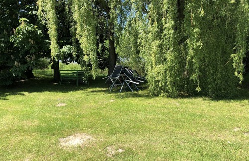 Heckengereuth Condo | Large, cozy vacation apartment by the mountain lake with private sunbathing lawn
