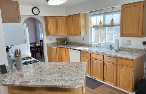 Turnagain House | Large home with view of float plane lake