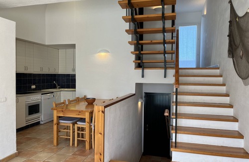 Fornells Ski Chalet | Large house with shared pool near the sea