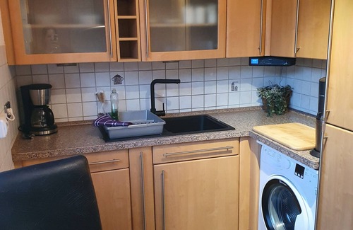 West Condo | Large maisonette near Düsseldorf Central yet quiet with garden and underground parking space
