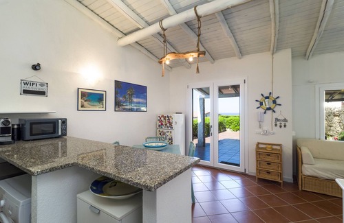 Porto San Paolo Ski Chalet | Laura's Terrace - terraced house with seaview