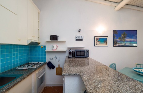 Porto San Paolo Ski Chalet | Laura's Terrace - terraced house with seaview