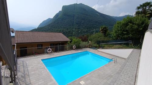 Fonteno House | Le Terrazze - 2 rooms flat with a pool and a terrace with a stunning lake view