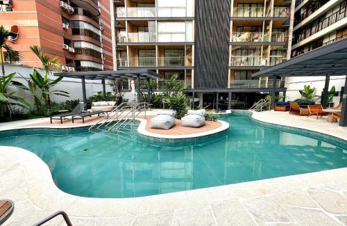 Leblon Apartment | Leblon Studio - View of the Christ, pool and gym