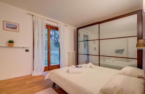 Sasso Moro Apartment | Lenni Apart Swimming Pool and lake - Happy Rentals