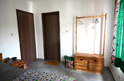 Ouidah House | Les Amazones Rouges Chambre Verte