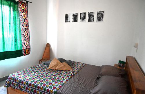 Ouidah House | Les Amazones Rouges Chambre Verte