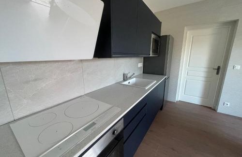 Baden Apartment | Les Hauts de Locmiquel apartment with private heated pool