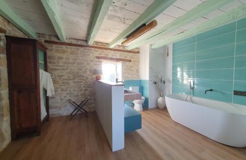 Reilhaguet Bed & Breakfast | Les Pierres Lotoises - chambre dhôtes Le Pigeonnier