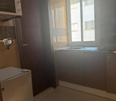 Sfax Apartment | Les portes délavées