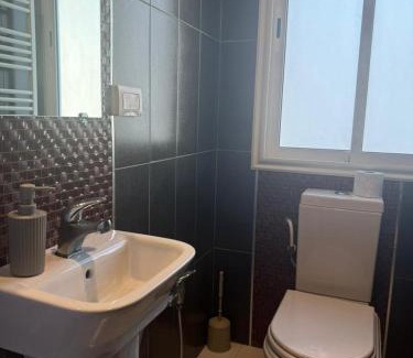 Sfax Apartment | Les portes délavées
