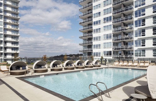 South Lake Union House | Level Seattle - Well Appointed Deluxe One Bedroom Suite + Office. Full Epicurian Kitchen and in suite laundry.