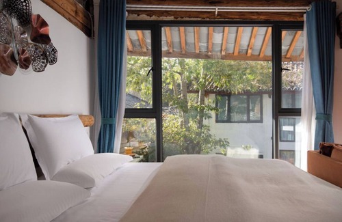 Gucheng Bed & Breakfast | lijiangluxianbaomimihuayuankezhan
