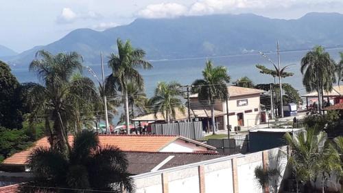 Martim de Sa Apartment | lindo apartamento martim de sá 2 dormitórios piscina pé na areia 32 b