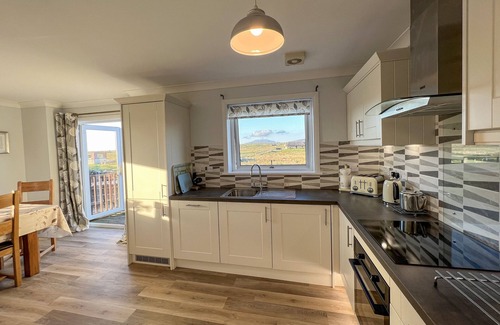Pollachar Cottage | LINGEIGH, pet friendly in Daliburgh, Isle Of South Uist