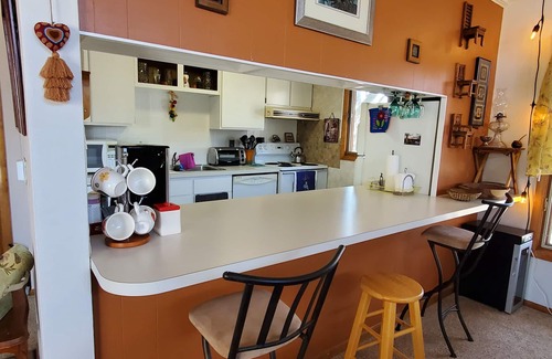 Cedar Falls Apartment | Local Comfort with Int'l Flair
