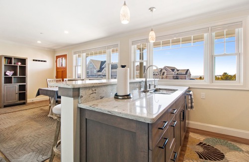 Pine Point Condo | Located directly on the white sands of Pine Point Beach.