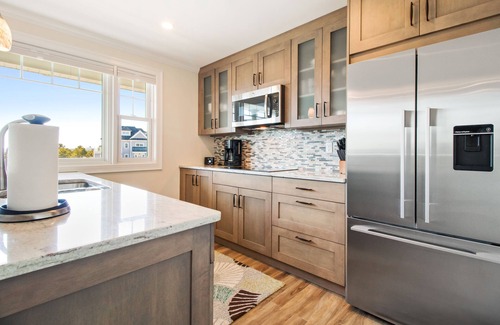 Pine Point Condo | Located directly on the white sands of Pine Point Beach.