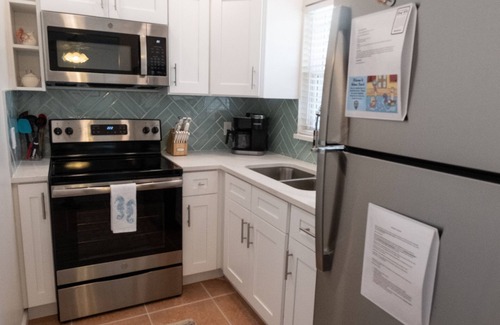 Ilexhurst Condo | LOCATION! Cabana just steps from the beach!