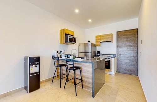 Akumal Apartment | Lock-off apartment with balcony, rooftop pool, & kitchen - near beach