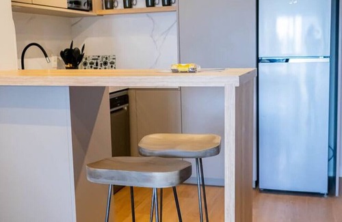 Pocitos Apartment | Loft con vista parcial al mar a pasos del WTC