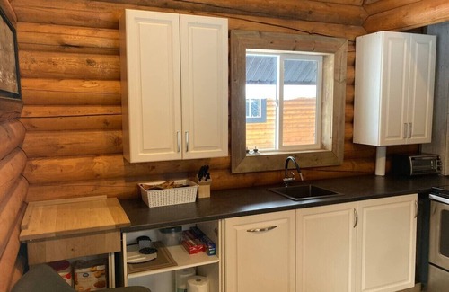 Central Okanagan Apartment | Lofted log cabin with fire table