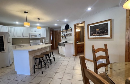 St. Joseph Apartment | LOG BEAR DEN near SJU, CSB & Wobegon Trail. Relaxing. Romantic. Refined. Rustic.