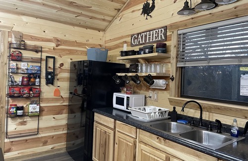 Llano Cabin | Log cabin on the river