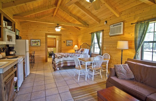 Daingerfield Cabin | Log cabin overlooking a private lake on a working farm