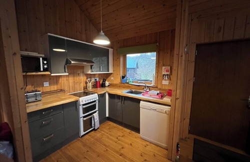 Dallavich Ski Chalet | Log Cabin with Hot tub close to the shores of Loch Awe with Fishing Rights