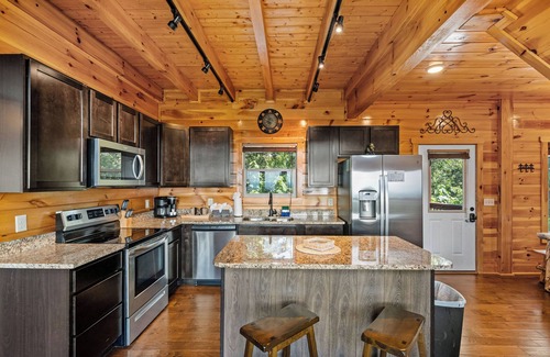 Sevierville Cabin | Long range sunset views from Hot Tub, free attractions, Resort pool,