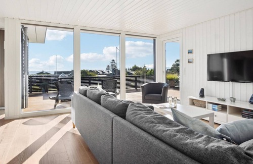 Hvidbjerg Strand House | Look forward to a magnificent sea view on vacation in this attractive vacation home.