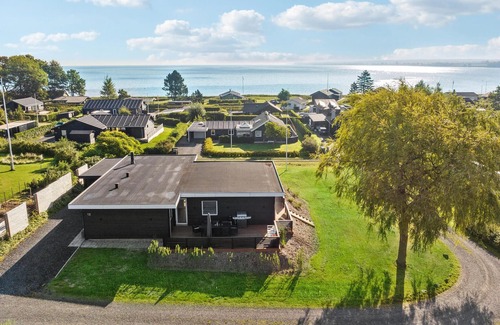 Hvidbjerg Strand House | Look forward to a magnificent sea view on vacation in this attractive vacation home.
