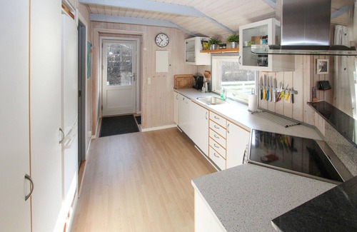 Marup House | Look forward to a vacation with your own sauna in this vacation home near the sea!
