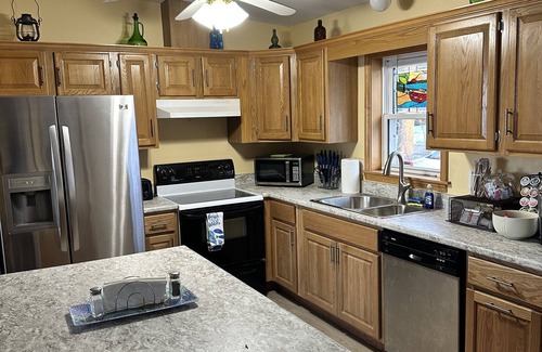 Cumberland Head House | Loon Beach Lake House is on a quiet dead end road with private lake front