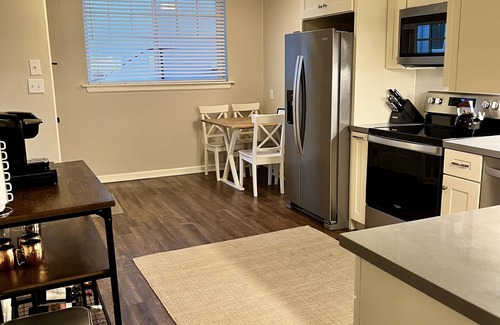 Trestle Glen House | Lovely 2 bed/1 bath duplex unit with parking, in-unit laundry and shared yard.