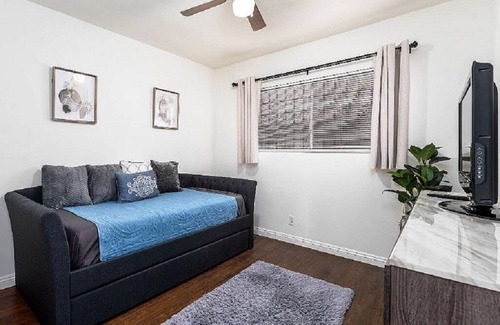 Inglewood Apartment | Lovely 2-bedroom lower unit 2, dual televisions, WiFi, gated building & parking