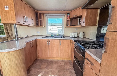 Louth House | Lovely 6 berth caravan with decking at Sunnydale Holiday Park ref 35130SD