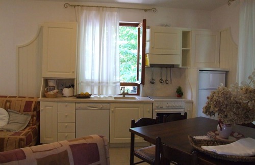 Sassetta Apartment | Lovely apartment for 5 guests with pool, WIFI, TV, patio and parking