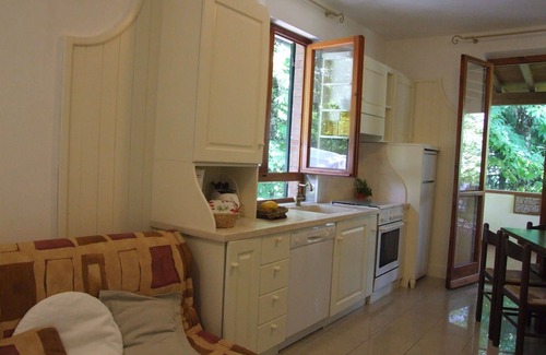 Sassetta Apartment | Lovely apartment for 5 guests with pool, WIFI, TV, patio and parking