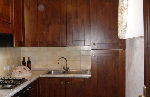 Il Poggio Apartment | Lovely apartment for 6 guests with WIFI, pool, TV, patio, pets allowed, panoramic view and parking